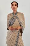 Shop Rishi And Soujit Beige Organza, Crepe, Lycra Blouse Sweetheart Cape Pre-draped Saree And Set Online at Aza Fashions Shop_Rishi And Soujit_Beige Organza, Crepe, Lycra Blouse Sweetheart Cape Pre-draped Saree And Set _Online_at_Aza_Fashions