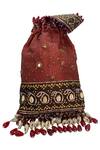 Shop The Garnish Company Maroon Embroidered Mujal Bandhej Tassel Potli Bag at Aza Fashions Shop_The Garnish Company_Maroon Embroidered Mujal Bandhej Tassel Potli Bag _at_Aza_Fashions