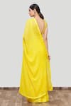Shop_Neha Khullar_Yellow Georgette Embroidery V Neck Embellished Saree With Blouse _at_Aza_Fashions