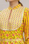 Kunwarani Ritu_Yellow Cotton Mandarin Collar Floral Motif Peplum Kurta Set _at_Aza_Fashions
