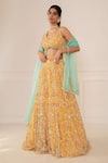 Buy_Mani Bhatia_Yellow Net Embroidery Leaf Neck Bridal Lehenga Set _at_Aza_Fashions