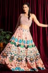 Buy_Aayushi Maniar_Peach Embroidery Asymmetric Floral Motif Lehenga Set _at_Aza_Fashions