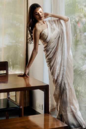 Juanita- Handwoven Tissue Silk Saree in Champange Color with border color