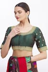 Buy_Samyukta Singhania_Green Net Embroidered Floral Round Blouse _at_Aza_Fashions