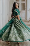 Anjana Bohra_Green Raw Silk, Organza, Banarasi Zari Work V Neck Floral Lehenga Set_Online_at_Aza_Fashions