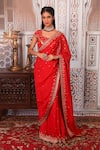 Buy_Esha Koul_Red Georgette Embellished Nakshi Work Scoop Neck Saree With Blouse _at_Aza_Fashions