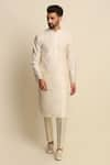 Priyanka Jain_White Raw Silk Embroidered Floral Motifs Sherwani And Kurta Set _Online_at_Aza_Fashions