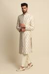 Buy_Priyanka Jain_White Raw Silk Embroidered Floral Motifs Sherwani And Kurta Set _Online_at_Aza_Fashions