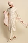 Shop_Priyanka Jain_Beige Raw Silk Embroidered Floral Motifs Sherwani And Kurta Set_at_Aza_Fashions