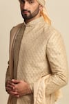 Priyanka Jain_Gold Raw Silk Embroidered Dori Work Sherwani And Kurta Set_at_Aza_Fashions