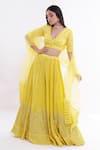 Buy_Komal Shah_Yellow Lehenga Chanderi Blouse And Dupatta Organza Striped Plunge V Dhoop Set _at_Aza_Fashions