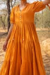 Shop_Myaara_Orange Mul Plain V Neck Tie Up Sleeve Flared Dress _Online_at_Aza_Fashions