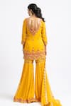 Shop_Nitika Gujral_Yellow Georgette Embroidered Zari V Neck Kurta Gharara Set _at_Aza_Fashions