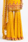 Nitika Gujral_Yellow Georgette Embroidered Zari V Neck Kurta Gharara Set _at_Aza_Fashions