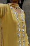 Shop_Radha Sharma_Yellow Georgette Embroidered Floral Motifs Leaf Neck Kurta Pant Set  _Online_at_Aza_Fashions