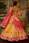 Shop_Mayyur Girotra Couture_Yellow Printed Gota V Neck Darbar Silk Patola Bridal Lehenga Set  _at_Aza_Fashions