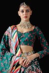 Shop_Mayyur Girotra Couture_Green Silk Printed Patola Leaf Neck Popat Kunjar Bridal Lehenga Set  _at_Aza_Fashions