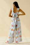 Shop Pozruh By Aiman Blue Hemp Floral Scallop Neck Kelly Tie-back Jumpsuit at Aza Fashions Shop_Pozruh By Aiman_Blue Hemp Floral Scallop Neck Kelly Tie-back Jumpsuit _at_Aza_Fashions