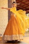 Buy_Basanti - Kapde Aur Koffee_Yellow Raw Silk Embroidered Sequins One Shoulder Draped Choli And Lehenga Set _Online_at_Aza_Fashions