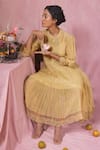 Shop_Chokhi Chorri_Yellow Malai Cotton Plain Band Collar Tiered Smocked Yoke Dress _at_Aza_Fashions