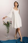 Buy_Couché By Anandini_White Punto Plain Asymmetric Neck Dress _at_Aza_Fashions