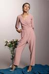 Buy_Couché By Anandini_Pink Punto Plain V Neck Front Tie-up Jumpsuit _at_Aza_Fashions
