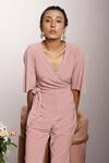 Couché By Anandini_Pink Punto Plain V Neck Front Tie-up Jumpsuit _Online_at_Aza_Fashions