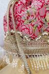 Shop_Amyra_Red Pearls, Beads, Embroidery Floral Motif Potli Bag _at_Aza_Fashions