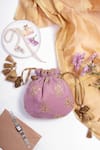 Buy_Amyra_Purple Embroidery, Tassels Velvet Potli Bag _at_Aza_Fashions