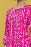 Naintara Bajaj_Pink Cotton Printed Bandhani And Floral Round Kurta & Skirt Set_at_Aza_Fashions