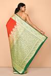 Shop_Nazaakat by Samara Singh_Orange Banarasi Silk Handloom Woven Paisley Saree_at_Aza_Fashions