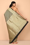 Shop_Nazaakat by Samara Singh_Black Banarasi Silk Handloom Woven Floral Pattern Saree With Running Blouse_at_Aza_Fashions