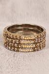 Buy Gold Plated Zircon Stones Embellished Bangles Set Of 4 by Samyukta