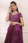 Isha Gupta Tayal_Purple Georgette Embroidered Cutdana V Neck Draped Lehenga Saree With Blouse _Online_at_Aza_Fashions