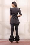 Shop_Isha Gupta Tayal_Black Crepe Lycra Plain V Neck Draped Peplum Top And Pant Set _at_Aza_Fashions