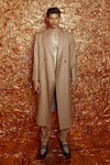 Nirmooha_Beige Suiting Notch Collar Trench Coat With Belt _at_Aza_Fashions