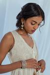 Latha Puttanna White Hand Woven Cotton Floral Motifs V Neck Daivani Shrug at Aza Fashions Latha Puttanna_White Hand Woven Cotton Floral Motifs V Neck Daivani Shrug _at_Aza_Fashions