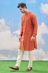 Shop_Tisa - Men_Orange Silk Viscose Blend Embroidered Scallop Full Sleeve Kurta Set  _at_Aza_Fashions