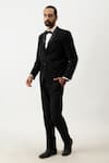 Shop_KAKA CALCUTTA_Black Suiting Fabric Shawl Collar Tuxedo And Pant Set _at_Aza_Fashions