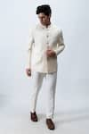 Buy_KAKA CALCUTTA_White Suiting Fabric Embroidery Thread And Mandarin Collar Bandhgala & Trouser Set _at_Aza_Fashions