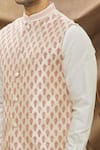 Vivek Karunakaran_Beige Poly Raw Silk Embroidered Thread Work Floral Bundi  _at_Aza_Fashions