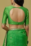 Ikshita Choudhary_Green Chanderi Printed Bandhani Round Embroidered Saree With Blouse _at_Aza_Fashions