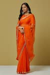 Ikshita Choudhary_Orange Chanderi Printed Bandhani Round Embroidered Saree With Blouse_Online_at_Aza_Fashions