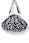 Buy_Samyukta Singhania_Black Embroidered Pearl Potli Bag_at_Aza_Fashions