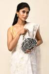 Shop_Samyukta Singhania_Black Embroidered Pearl Potli Bag_at_Aza_Fashions