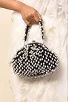 Samyukta Singhania_Black Embroidered Pearl Potli Bag_at_Aza_Fashions