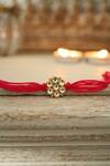 Shop_Paisley Pop_Red Diamonds Kundan Floral Gold Rakhi_at_Aza_Fashions