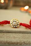 Shop Paisley Pop Red Crystals, Pearls Kundan Thread Rakhi at Aza Fashions Shop_Paisley Pop_Red Crystals, Pearls Kundan Thread Rakhi_at_Aza_Fashions