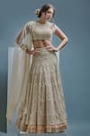 Buy_Cherie D_Beige Tulle Embroidery Thread Round Oyster Bridal Lehenga Set _at_Aza_Fashions