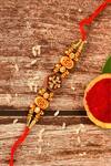 Buy_Nayaab by Aleezeh_Red Stone Temple Motif Rakhi_at_Aza_Fashions